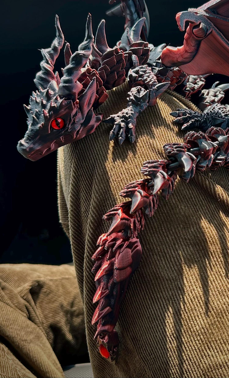 Decorative dragon figure on a textured surface